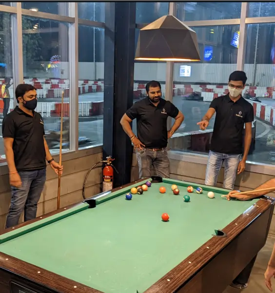 Team playing snooker game